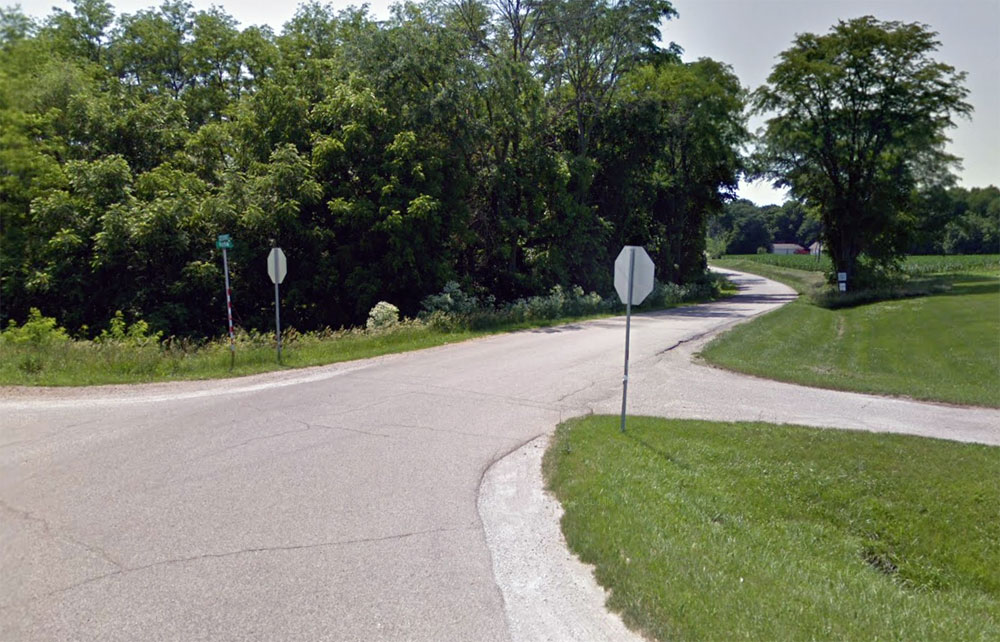 Entrance to 965 N. Main gate is three miles down the road.